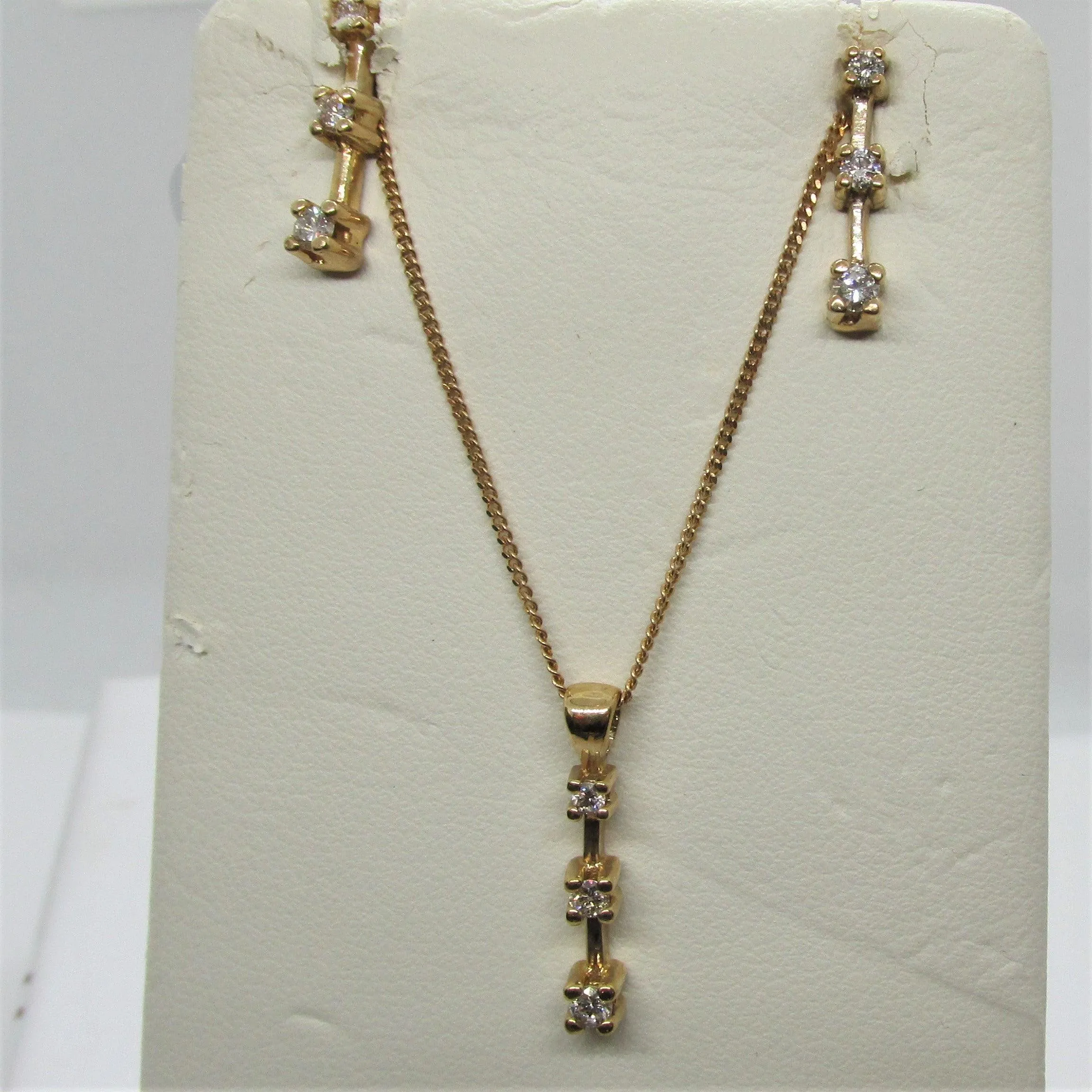 Three Stone Diamond Journey Pendant in Yellow Gold