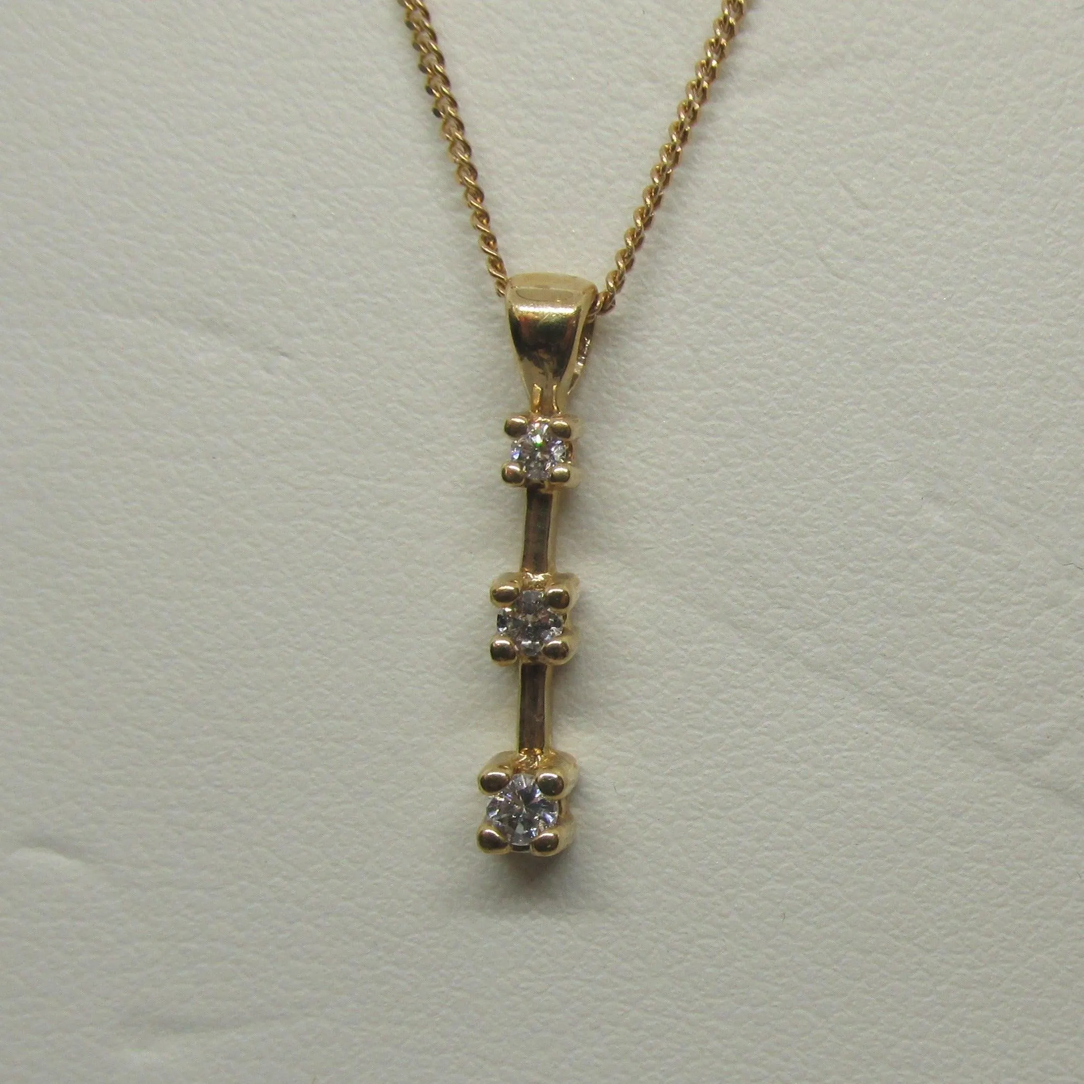 Three Stone Diamond Journey Pendant in Yellow Gold