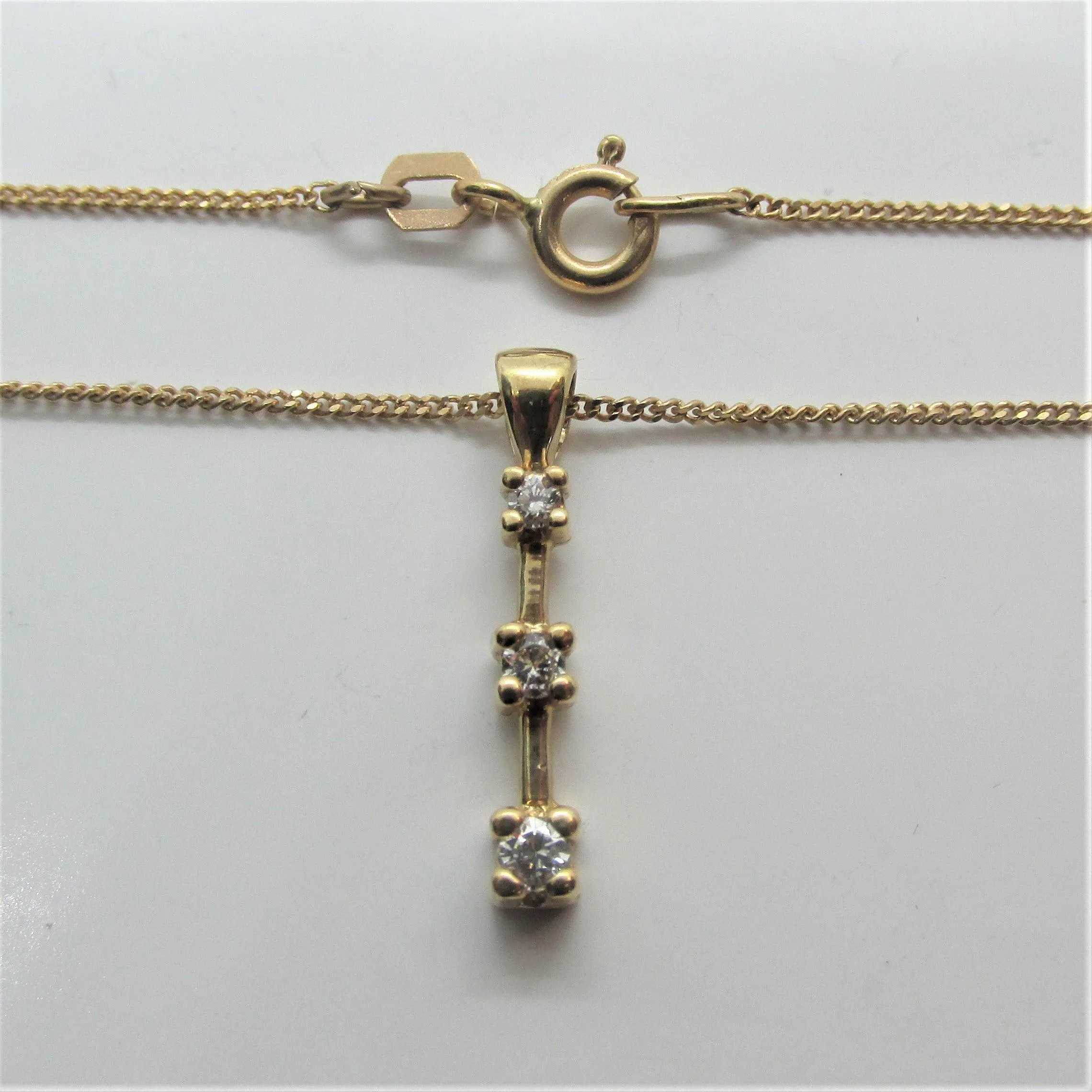 Three Stone Diamond Journey Pendant in Yellow Gold